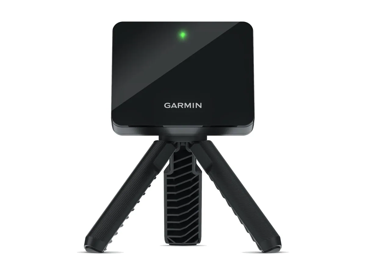 Garmin Approach R10 launch monitor on its tripod
