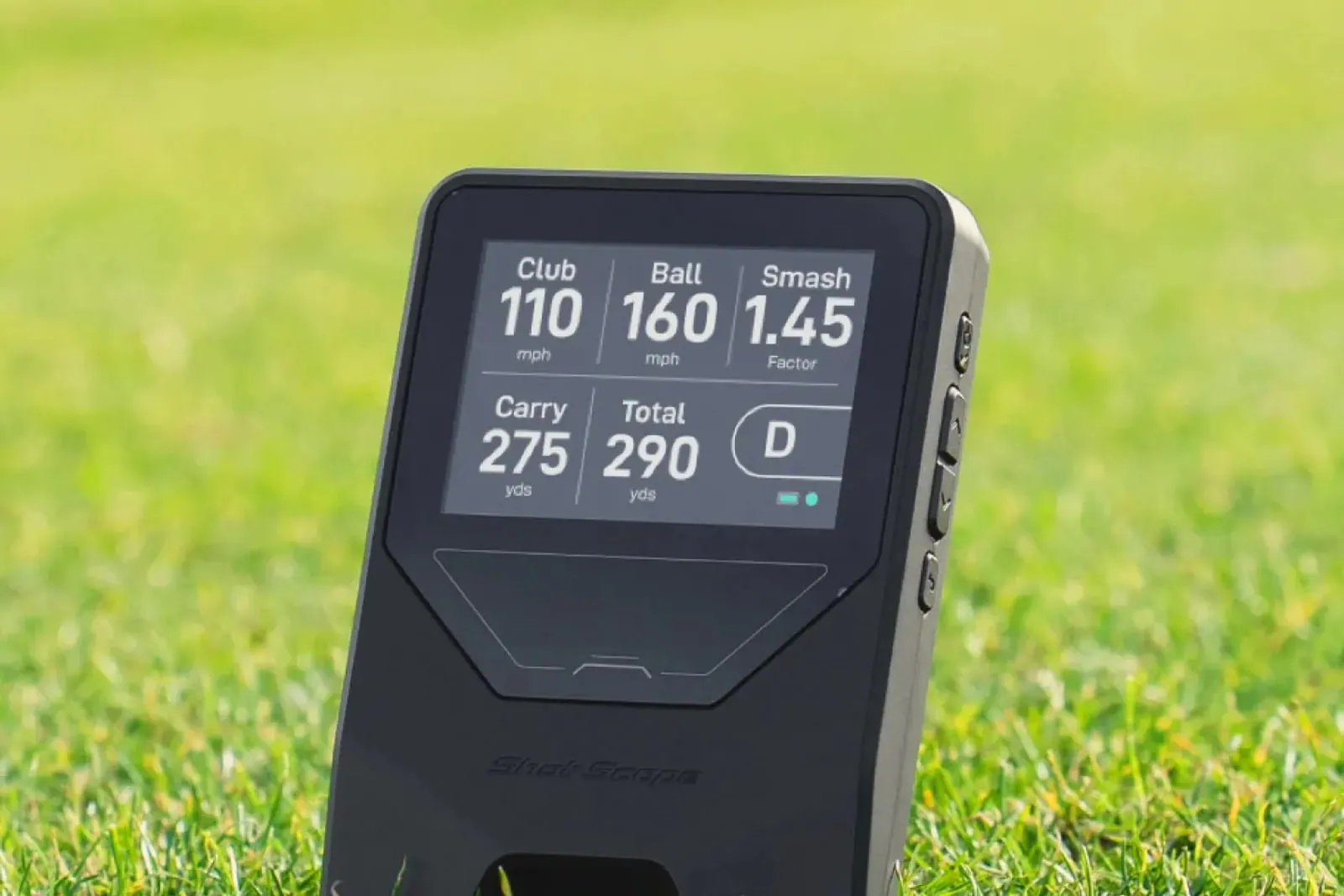 Shot Scope LM1 on the grass showing club and ball speed